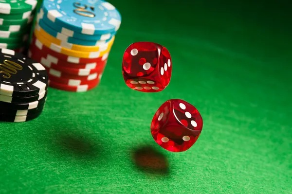 Live Teen Patti table at kembang toto with dealer and multiple players seated around HD-broadcast table